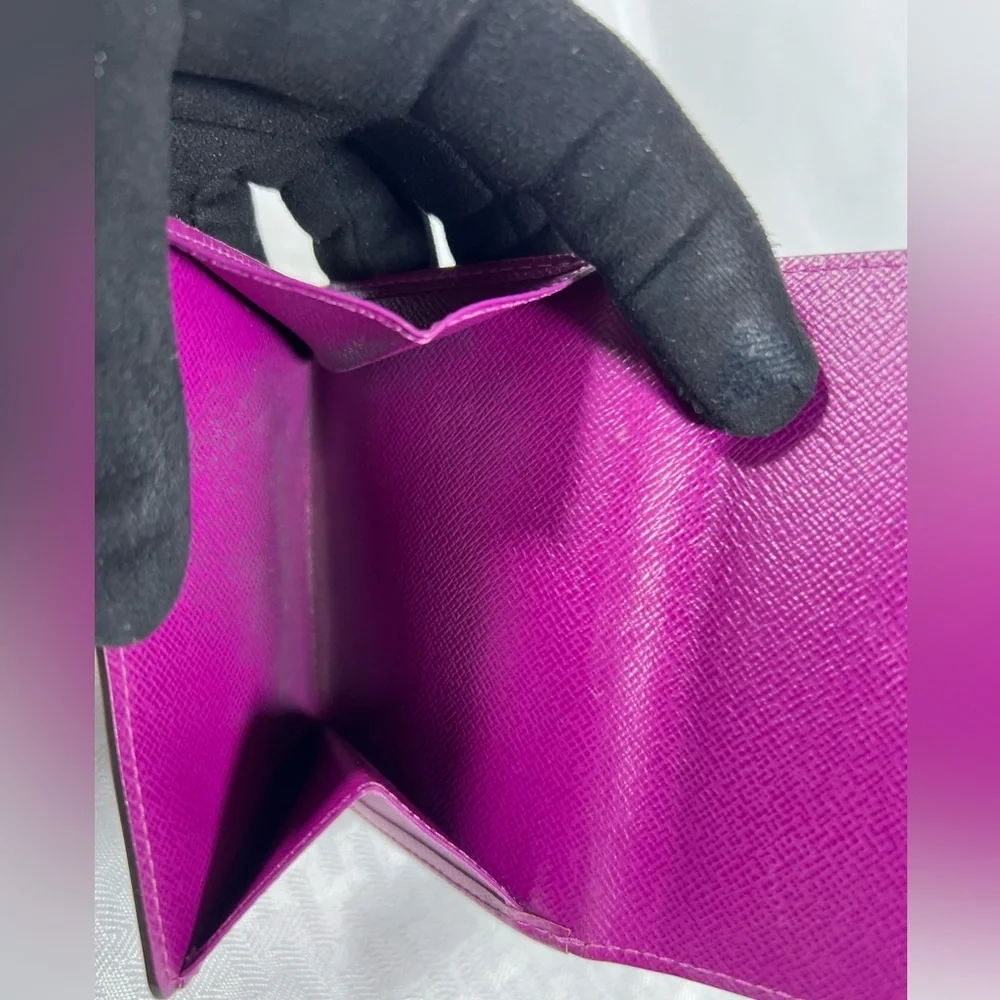 1136: Louis Vuitton Epi Leather Trifold Wallet Purple